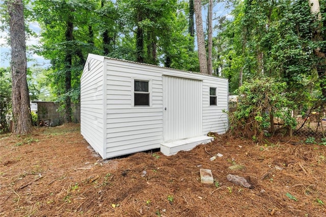 40 Melton Way, Covington, GA 30016 - view of shed with view of scattered trees