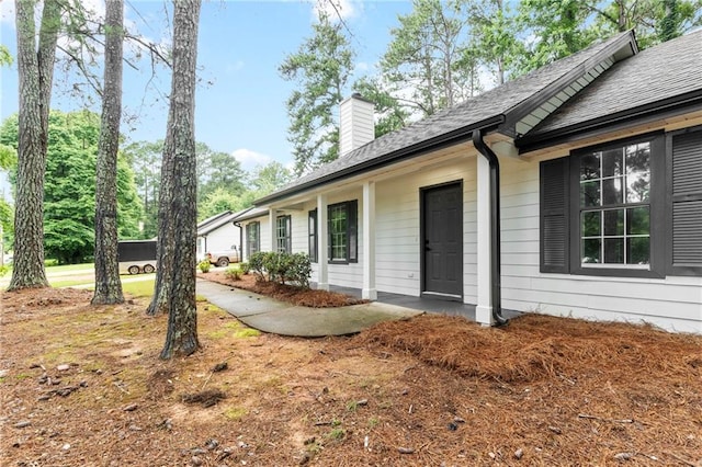 40 Melton Way, Covington, GA 30016 - view of home's exterior featuring a chimney