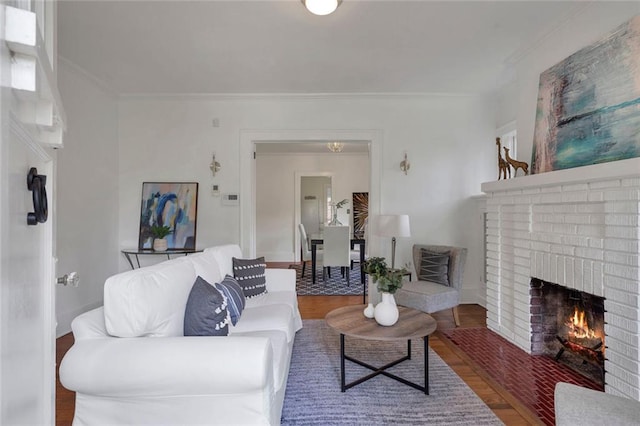 636 Cameron St SE, Atlanta, GA 30312 - living area with a fireplace, wood finished floors, and crown molding