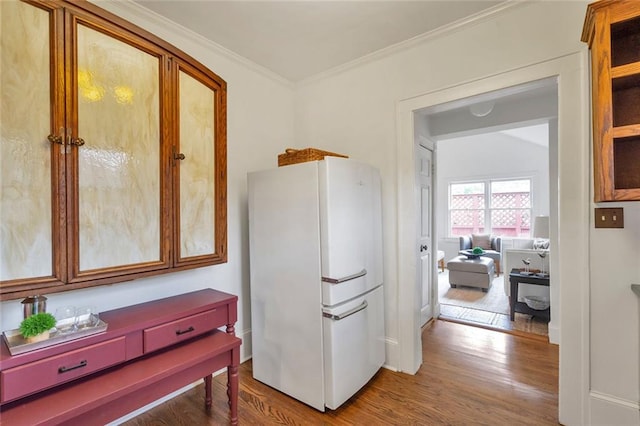 636 Cameron St SE, Atlanta, GA 30312 - kitchen featuring freestanding refrigerator, wood finished floors, and ornamental molding
