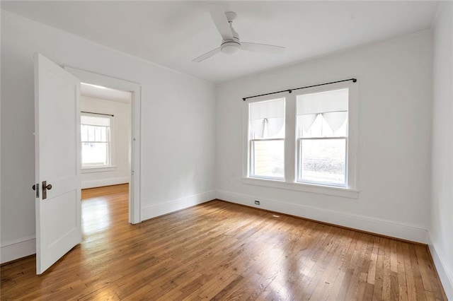 636 Cameron St SE, Atlanta, GA 30312 - unfurnished room with light wood-style floors, baseboards, ornamental molding, and a ceiling fan