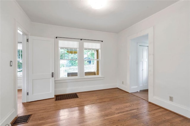 636 Cameron St SE, Atlanta, GA 30312 - spare room with wood finished floors and baseboards