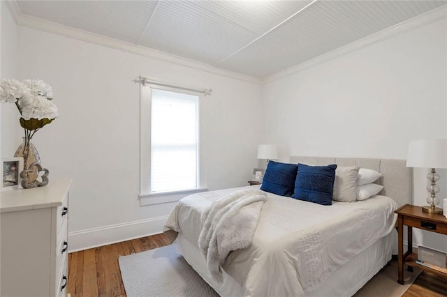636 Cameron St SE, Atlanta, GA 30312 - bedroom with wood-type flooring, crown molding, and baseboards