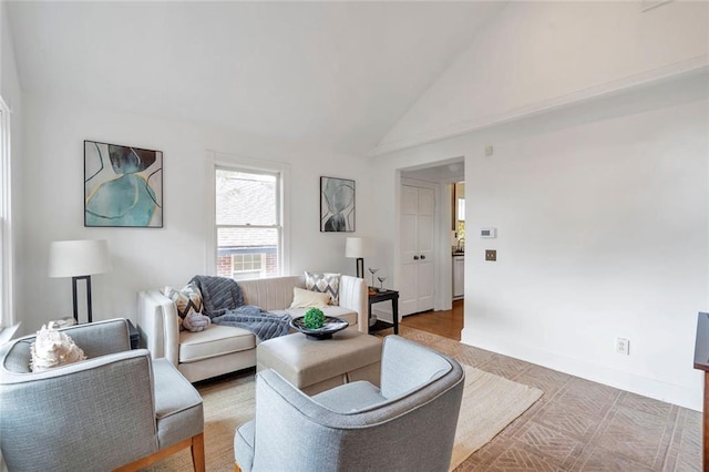 636 Cameron St SE, Atlanta, GA 30312 - living room with high vaulted ceiling and baseboards