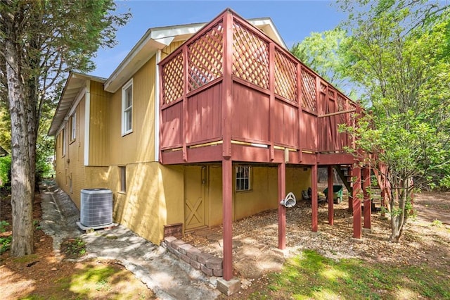 636 Cameron St SE, Atlanta, GA 30312 - rear view of property featuring cooling unit and a deck