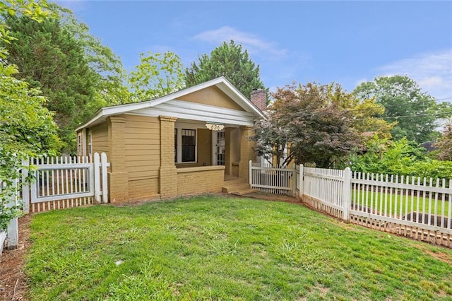 636 Cameron St SE, Atlanta, GA 30312 - view of side of home featuring a chimney and brick siding