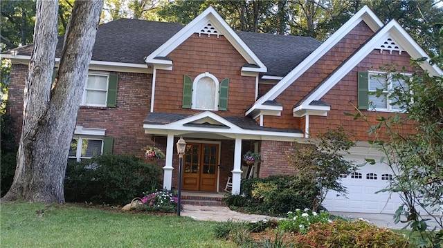 view of front facade featuring a garage and a front lawn