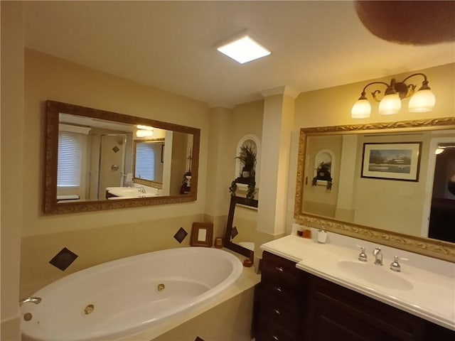 bathroom with independent shower and bath and vanity