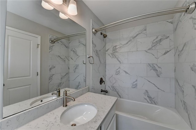 bathroom with tub / shower combination and vanity