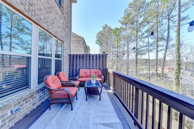 balcony featuring an outdoor living space