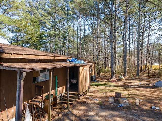 exterior space featuring an outbuilding