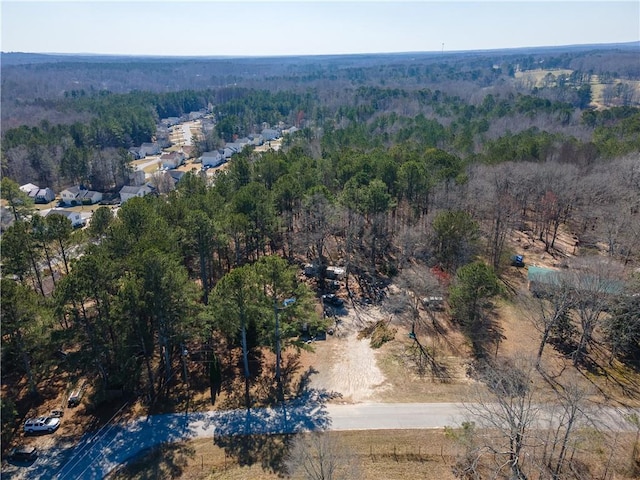 bird's eye view with a view of trees