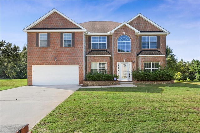 view of front of home with a front lawn, french doors, and a garage