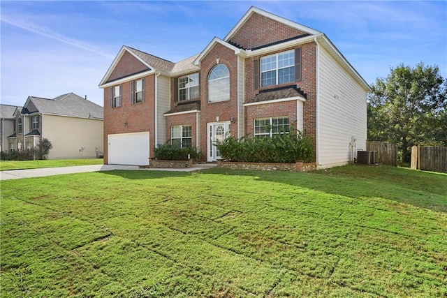 view of front property with a garage, central AC, and a front yard