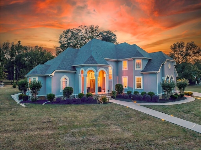 31 Meadow Lakes Ter, Cedartown, GA 30125 - french country home featuring stucco siding, a yard, and a shingled roof