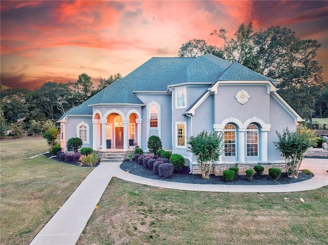 31 Meadow Lakes Ter, Cedartown, GA 30125 - french country inspired facade featuring stucco siding, a front yard, and a shingled roof