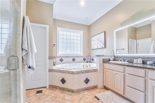 bathroom with ornamental molding, separate shower and tub, vanity, and a healthy amount of sunlight