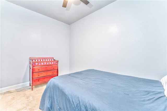 bedroom featuring ceiling fan