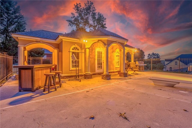 view of front of house with a patio area