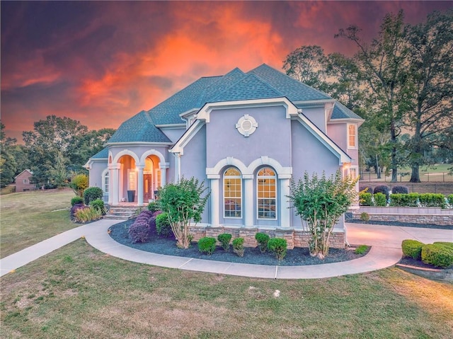 31 Meadow Lakes Ter, Cedartown, GA 30125 - view of front of property with stucco siding, a lawn, and roof with shingles