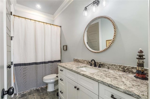 bathroom with tile patterned floors, vanity, toilet, and ornamental molding