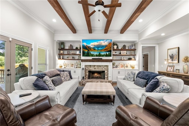 5821 Abbey View Ct, Clermont, GA 30527 - living area featuring a ceiling fan, crown molding, beam ceiling, a brick fireplace, and recessed lighting
