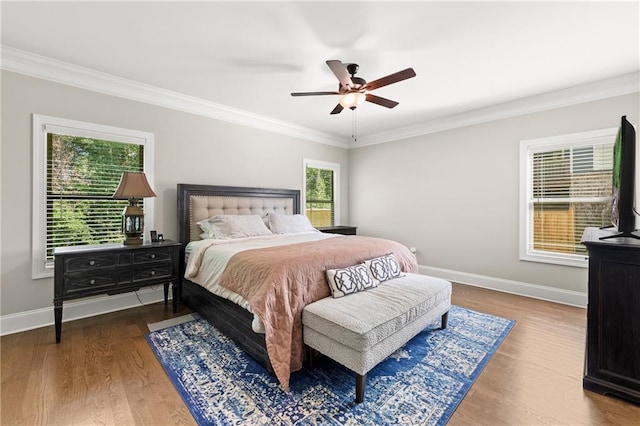 5821 Abbey View Ct, Clermont, GA 30527 - bedroom with crown molding, wood finished floors, and a ceiling fan