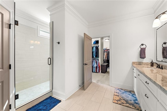 5821 Abbey View Ct, Clermont, GA 30527 - full bathroom featuring vanity, a shower stall, crown molding, and a walk in closet