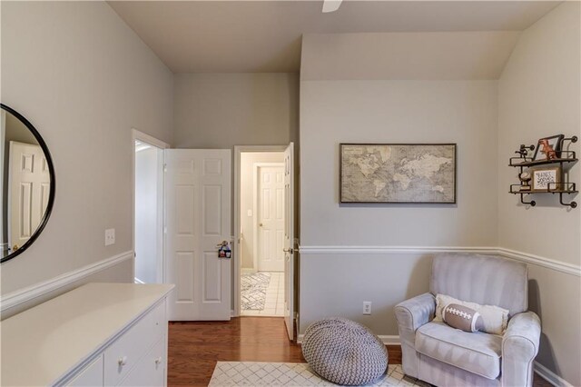 sitting room featuring wood finished floors