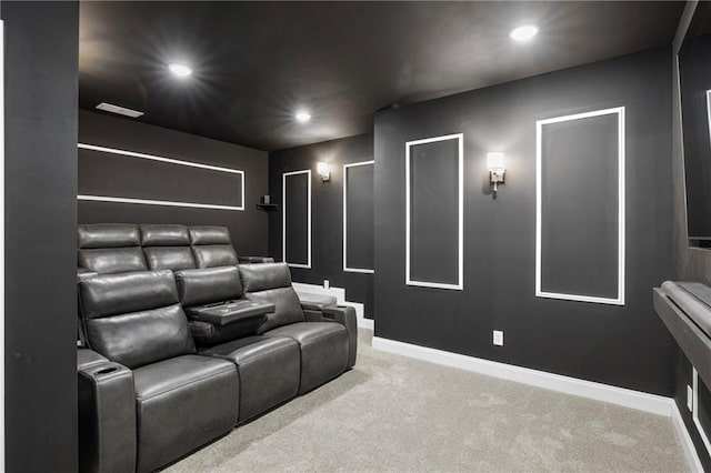 carpeted home theater featuring recessed lighting and baseboards