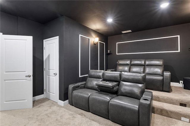 carpeted home theater with recessed lighting and baseboards