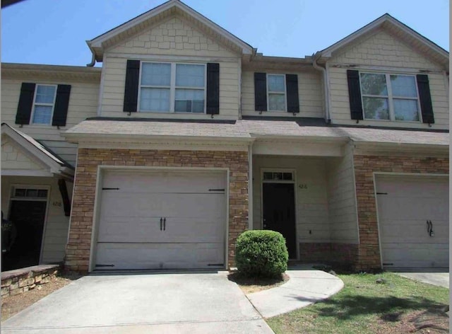 view of property featuring a garage