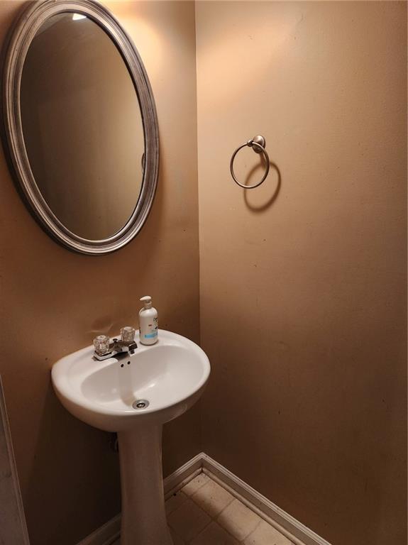 bathroom with tile floors