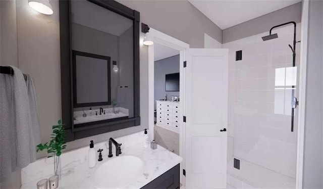 bathroom with vanity and walk in shower