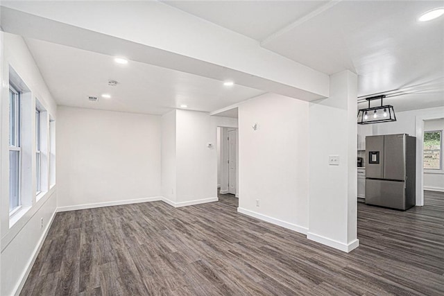 empty room featuring dark hardwood / wood-style floors