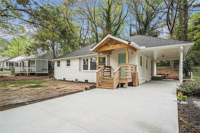 view of front facade featuring a carport