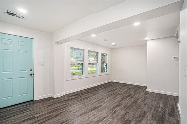 entryway with dark wood-type flooring