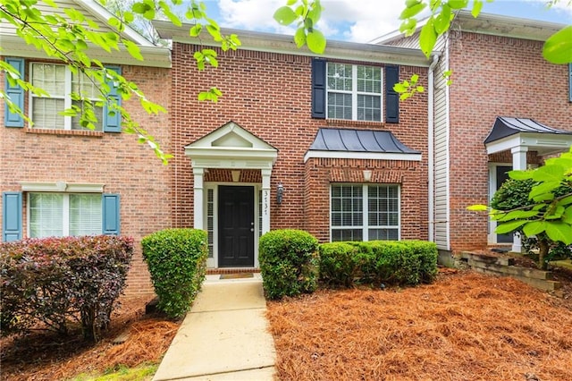 3737 Town Square Cir NW Unit 6, Kennesaw, GA 30144 - view of front of house with brick siding and a standing seam roof