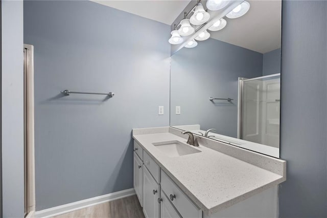 3737 Town Square Cir NW Unit 6, Kennesaw, GA 30144 - full bathroom featuring vanity, an enclosed shower, and wood finished floors