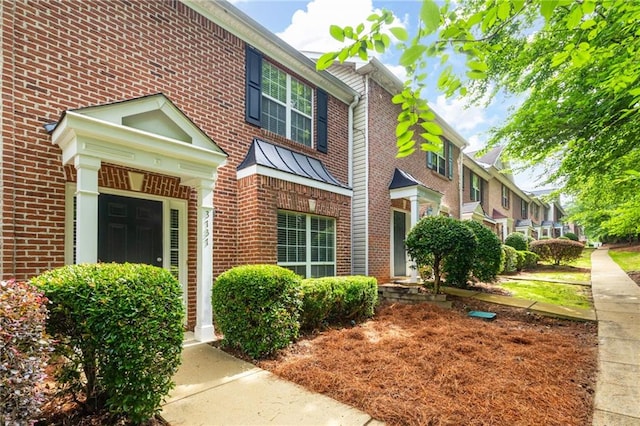 3737 Town Square Cir NW Unit 6, Kennesaw, GA 30144 - view of front facade featuring brick siding and a standing seam roof
