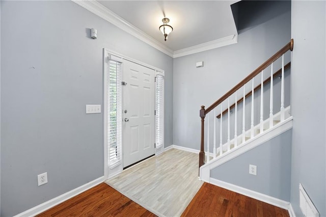 3737 Town Square Cir NW Unit 6, Kennesaw, GA 30144 - foyer featuring stairway, wood finished floors, and crown molding