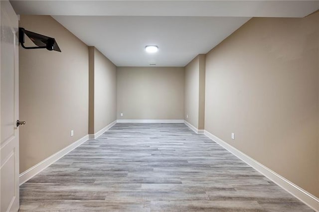 unfurnished room with light hardwood / wood-style flooring