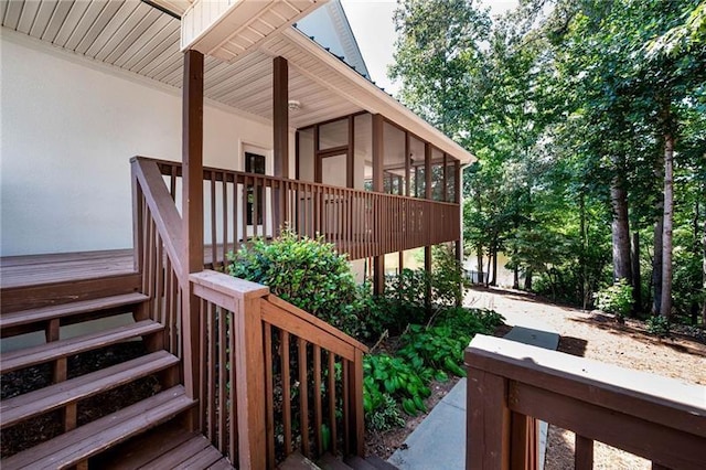 view of property exterior featuring a sunroom