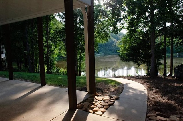 view of patio featuring a water view