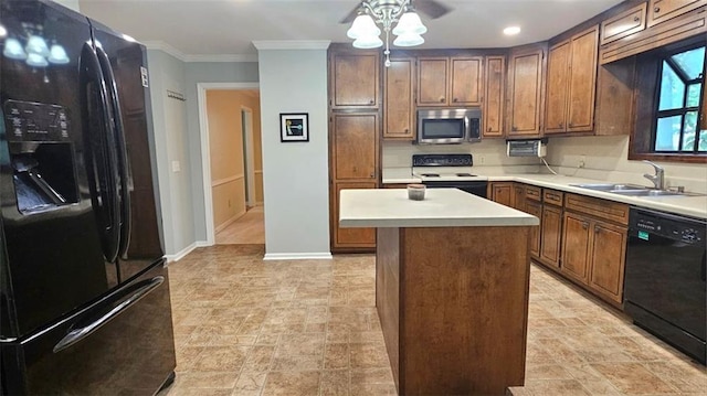 kitchen featuring black appliances, a sink, ceiling fan, baseboards, and ornamental molding