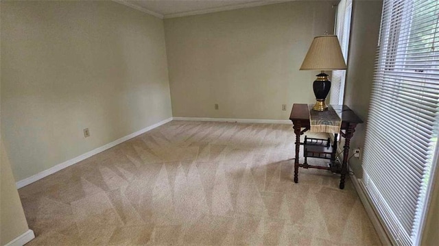 carpeted office with baseboards and ornamental molding