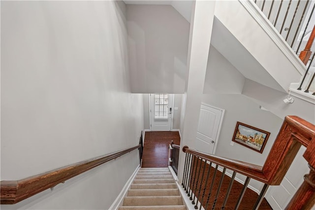 1655 Hampton Oaks Dr, Alpharetta, GA 30004 - staircase with high vaulted ceiling and carpet flooring