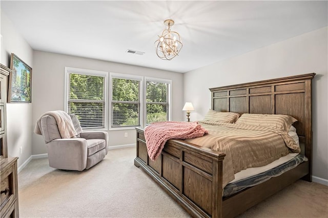 1655 Hampton Oaks Dr, Alpharetta, GA 30004 - bedroom featuring a chandelier and light colored carpet