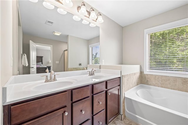 1655 Hampton Oaks Dr, Alpharetta, GA 30004 - full bathroom featuring connected bathroom, double vanity, and a bath