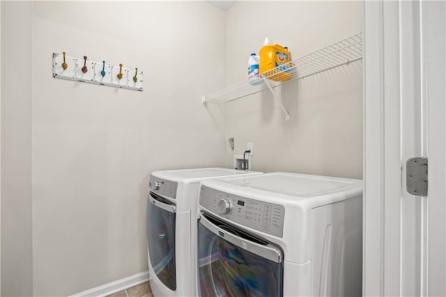 1655 Hampton Oaks Dr, Alpharetta, GA 30004 - washroom with washing machine and dryer and baseboards